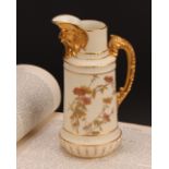 A Royal Worcester jug, decorated in the Aesthetic manner with flowers and foliage in muted tones,