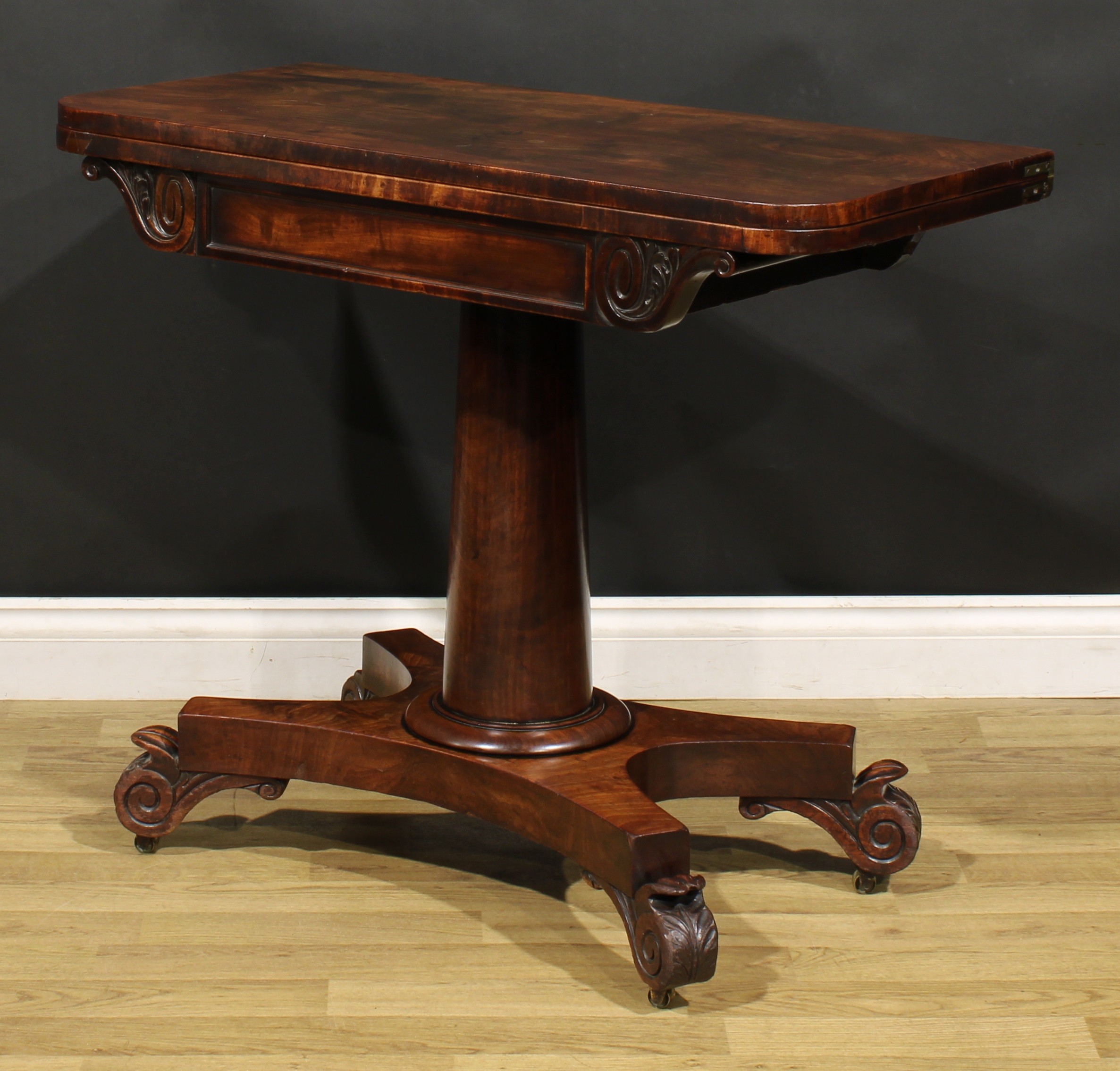 A George/William IV mahogany tea table, rounded rectangular folding top above a deep frieze carved - Image 5 of 6