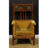 A large and unusual Arts & Crafts entrance hall chair, rectangular cresting rail carved with a