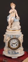 A 19th century French Louis XVI style porcelain mantel clock, 7.5cm white enamel dial inscribed with