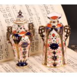 A Royal Crown Derby Imari elongated ogee shaped two-handled vase and cover, Japanesque angular