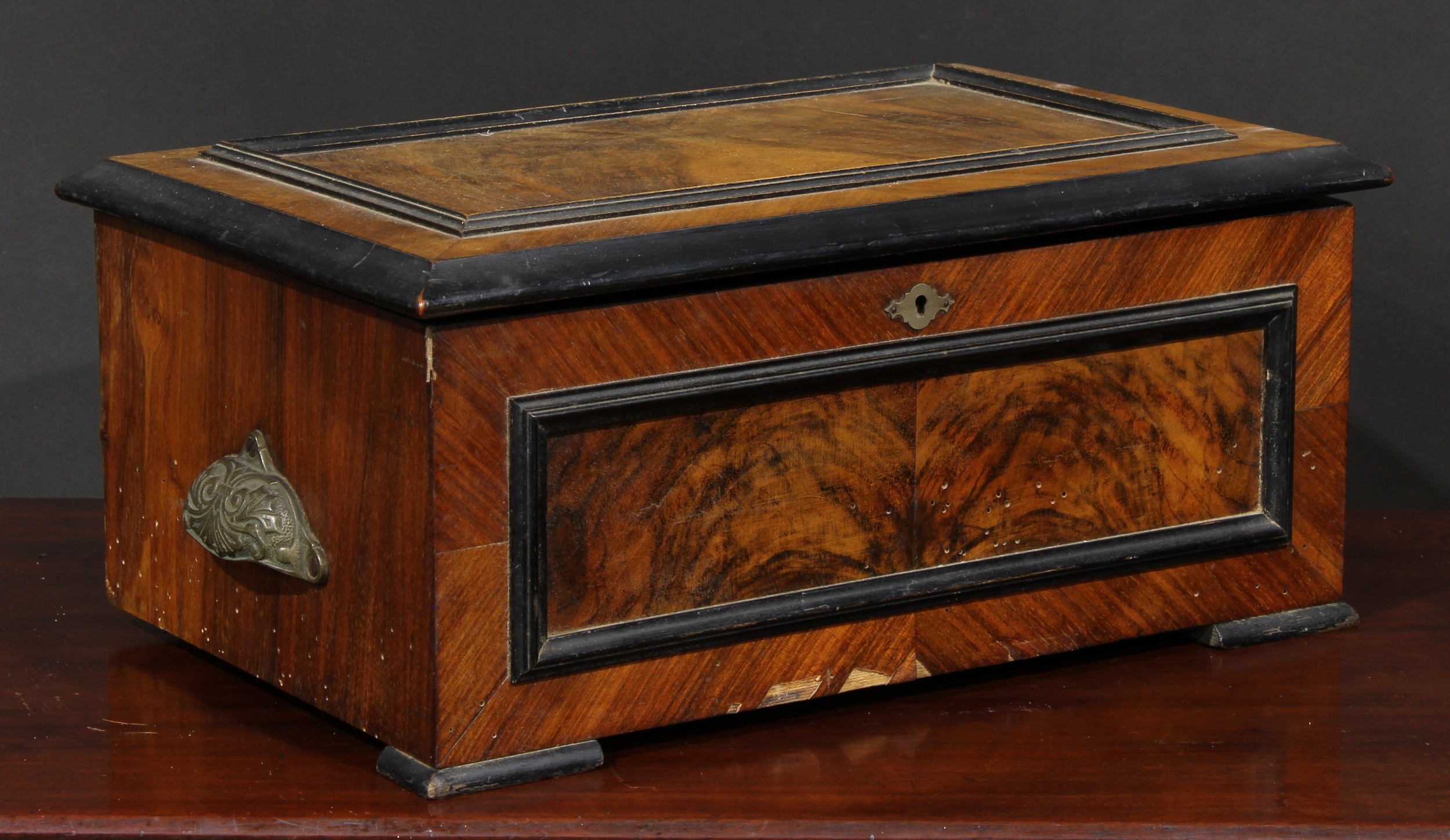 A late 19th century parcel-ebonised walnut symphonion, horizontal mechanism playing 23cm discs, - Image 3 of 4