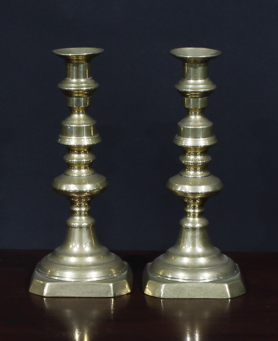 A pair of large Victorian brass baluster candlesticks, canted square bases, 41cm high, c.1880; - Image 5 of 6