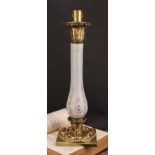 A neoclassical gilt metal and opaline glass table candlestick, stylised Corinthian capital, the