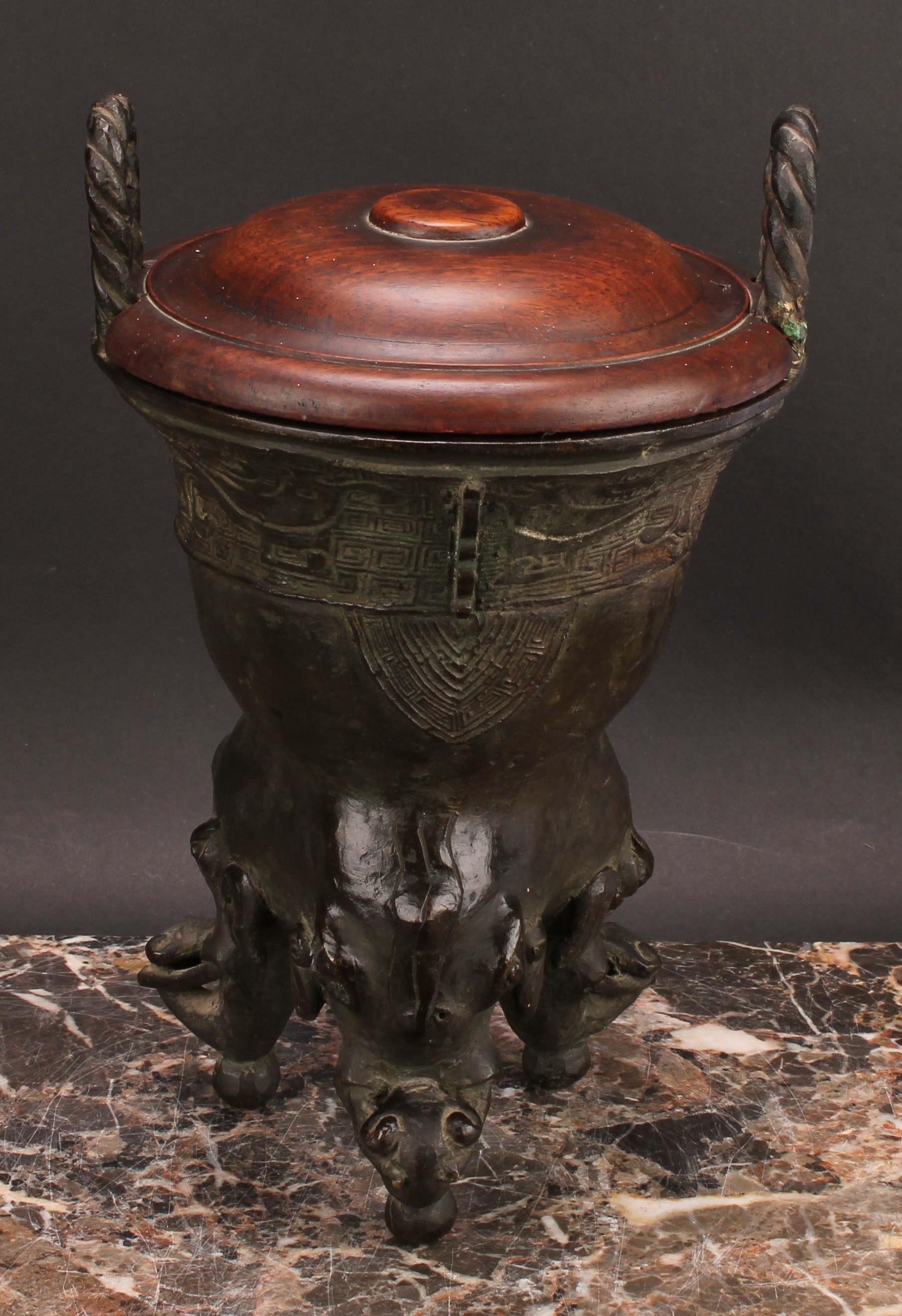 A Chinese patinated bronze ding censer, cast in the archaic manner, twist handles, outswept rim, - Image 5 of 5