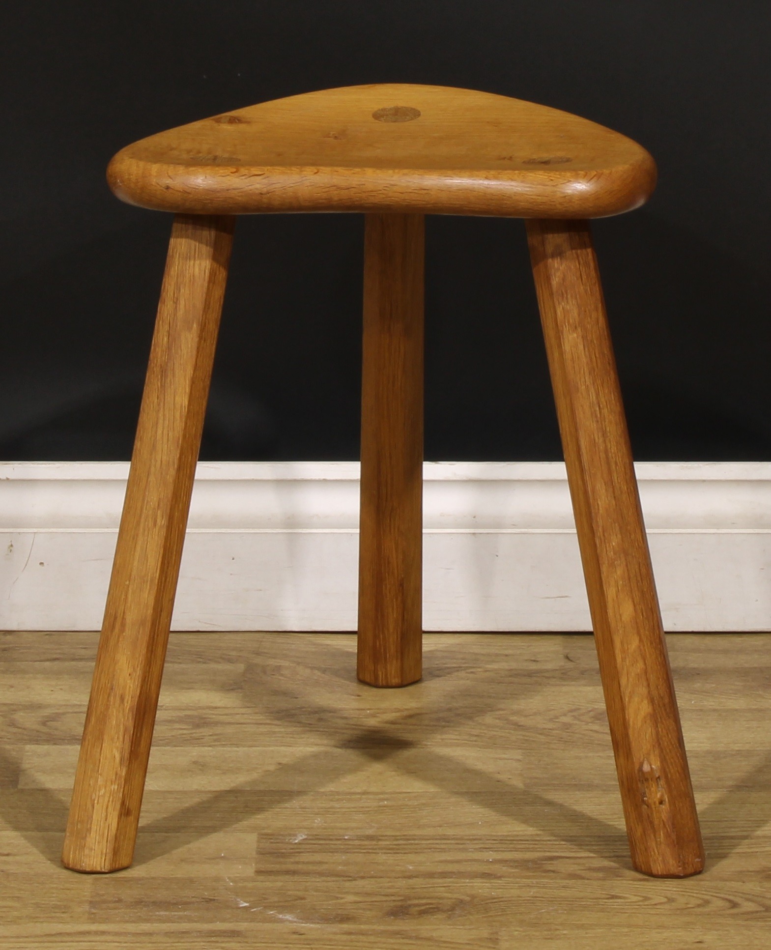 Derek Slater, Lizardman of Crayke, Yorkshire - an oak stool, of staked construction, adzed