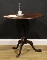 A George III mahogany tripod occasional table, one-piece circular tilting top, turned and wrythen