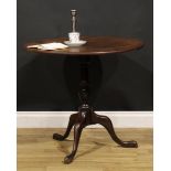 A George III mahogany tripod occasional table, one-piece circular tilting top, turned and wrythen