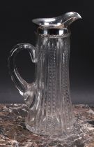 An American silver mounted cut glass wine jug, star-cut base, 25.5cm high, c.1920