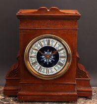 An Aesthetic Movement oak mantel clock, 15cm circular ceramic dial inscribed J Maple & Co,