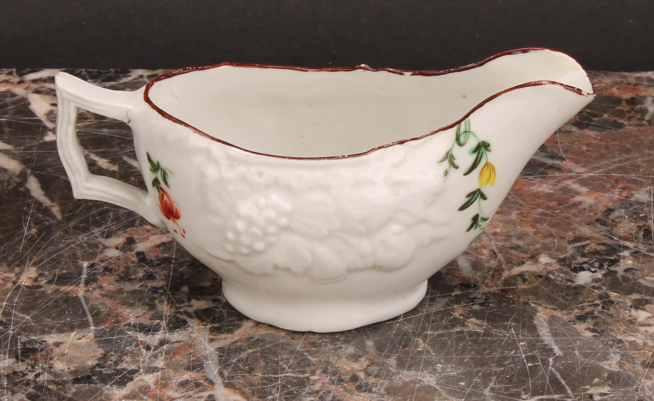 A Cookworthy Bristol butter boat, moulded with fruit, painted with floral swag and sprays, 10.5cm - Image 2 of 5