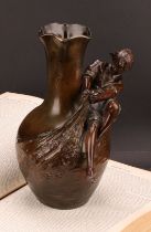 A dark patinated spelter figural vase, after Auguste Moreau, signed in the maquette, boy with full