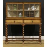 An early 20th century Queen Anne style walnut bookcase or display cabinet, by Hamptons, Pall Mall