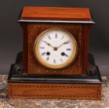 A late Victorian parcel-ebonised walnut mantel clock, 8.5cm circular enamel dial inscribed