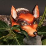 An English porcelain novelty stirrup cup, possibly Derby, modelled as a fox mask, naturalistically