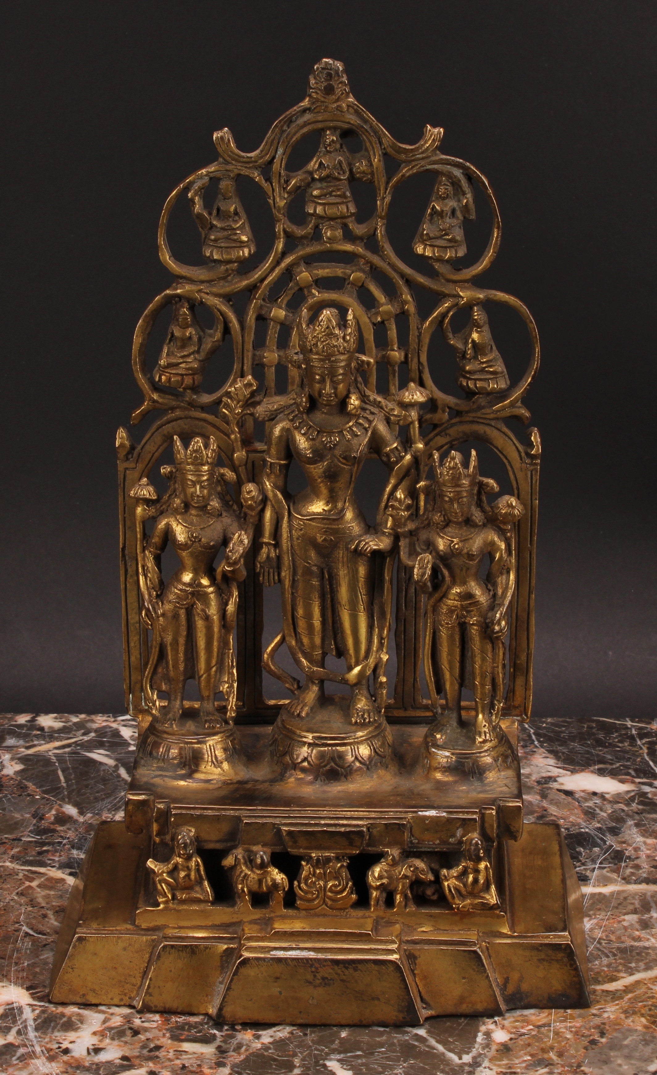A Chinese/Tibetan gilt bronze shrine figure, cast with three figures, calligraphy script to verso, - Image 2 of 5