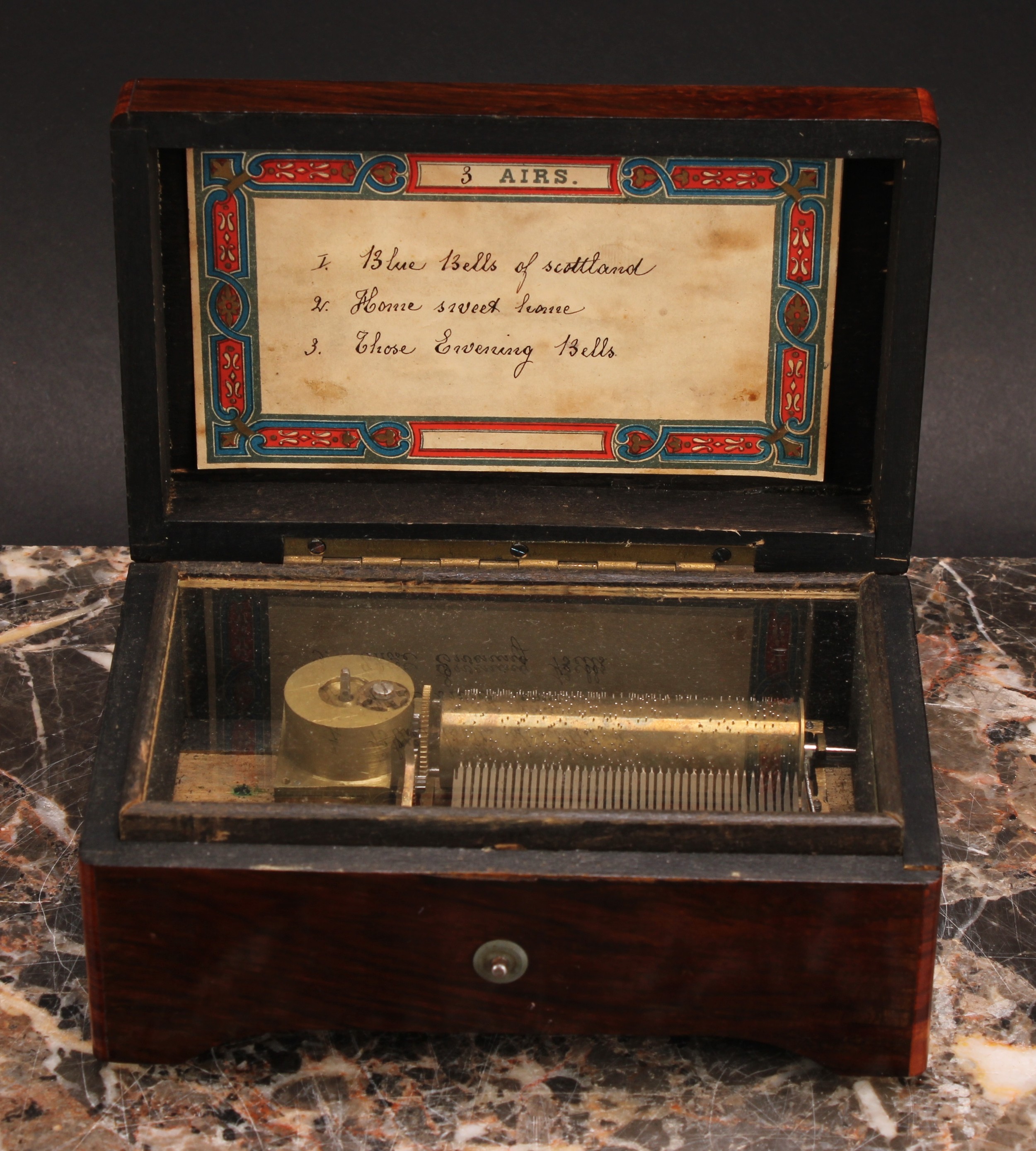 A 19th century satinwood crossbanded rosewood rectangular music box, of small proportions, 6cm