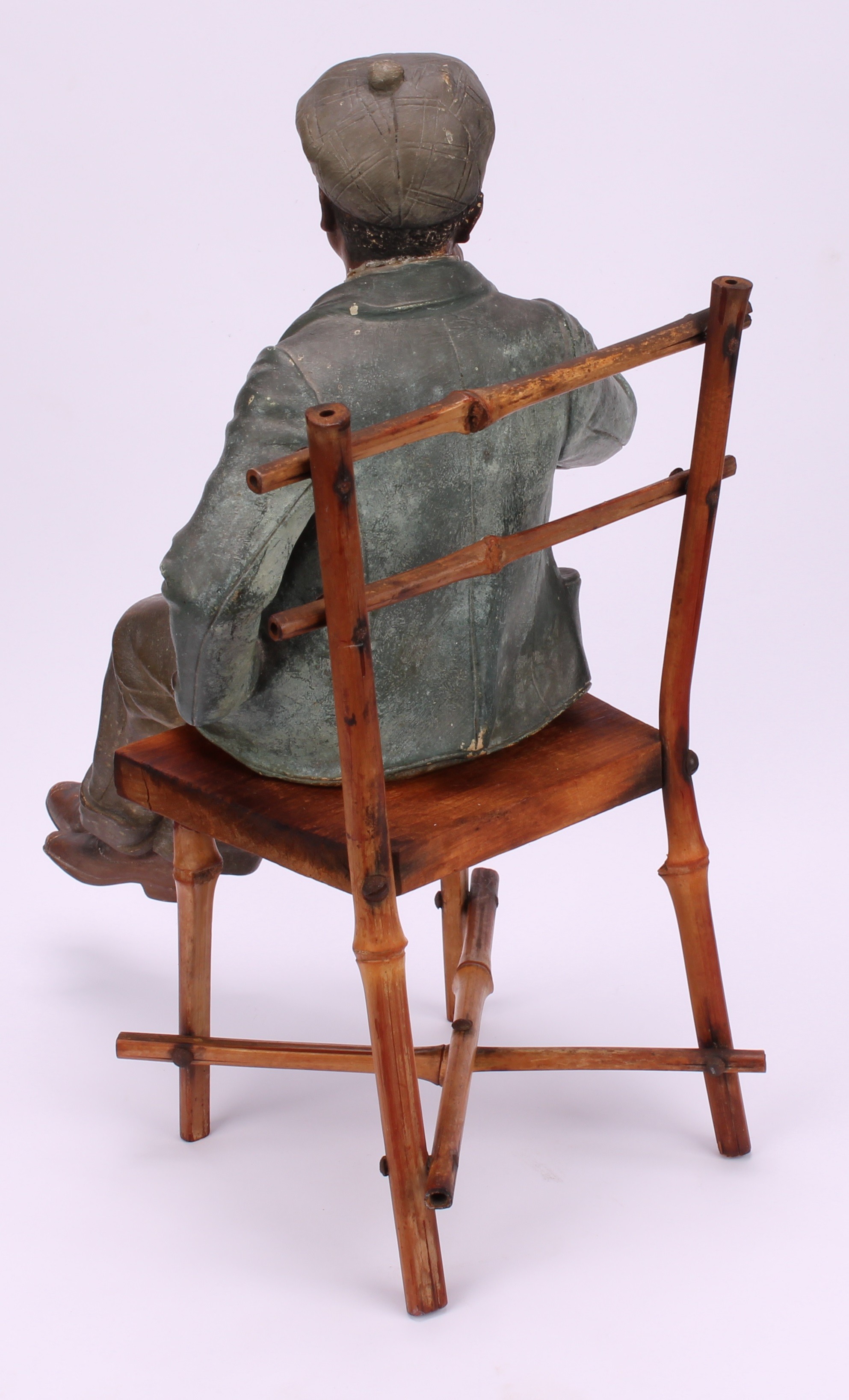 An early 20th century Austrian terracotta model, of a young African-American boy, finely dressed and - Image 4 of 5