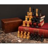 A boxwood and ebonised Staunton pattern weighted chess set, the Kings 8.5cm high