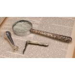 An Edwardian silver hafted magnifying glass, 16cm long, Adie & Lovekin Ltd, Birmingham 1907; a