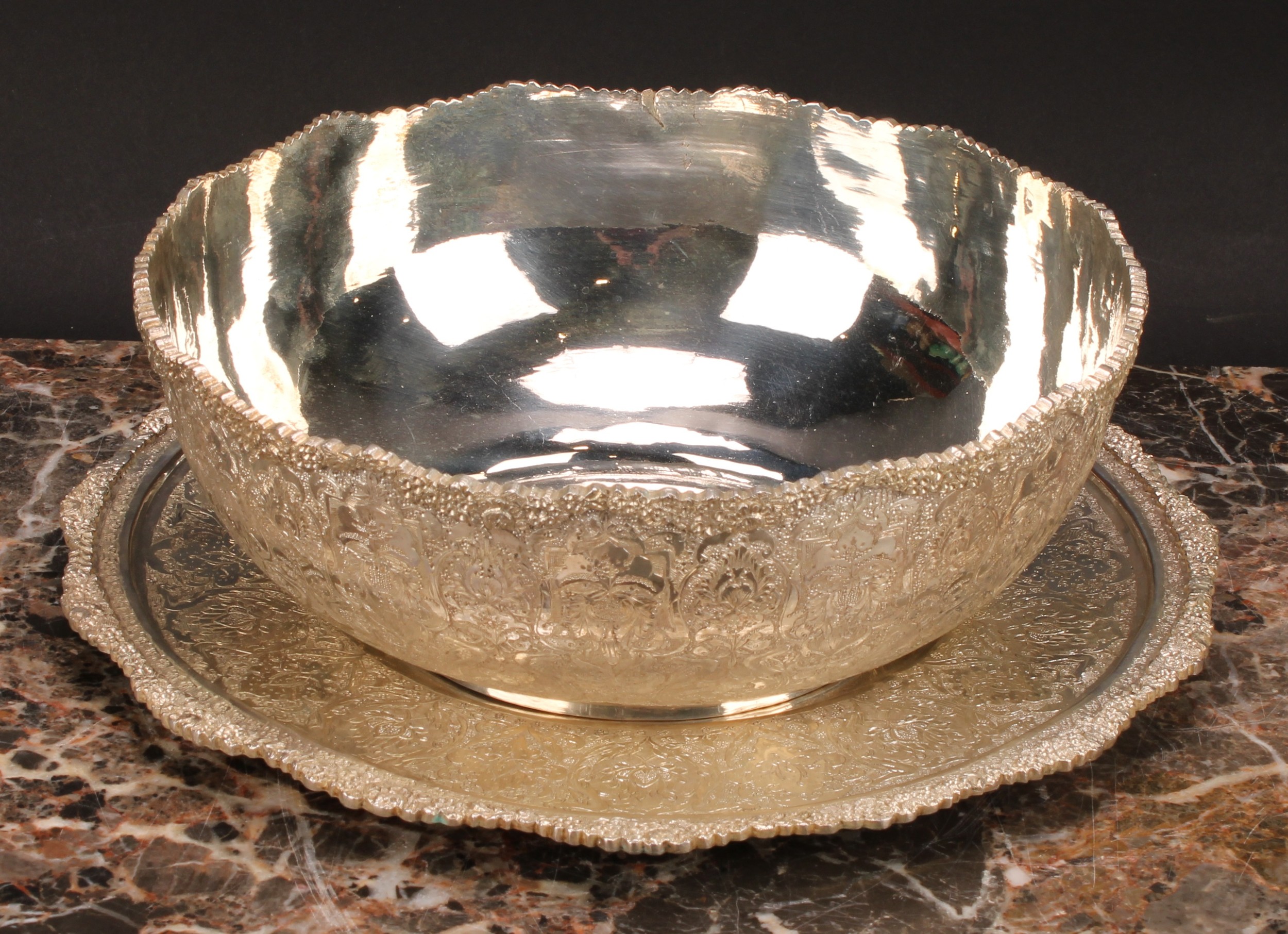 An Iranian white metal fruit bowl and stand, profusely chased in the Persian taste with lotus and - Image 4 of 6