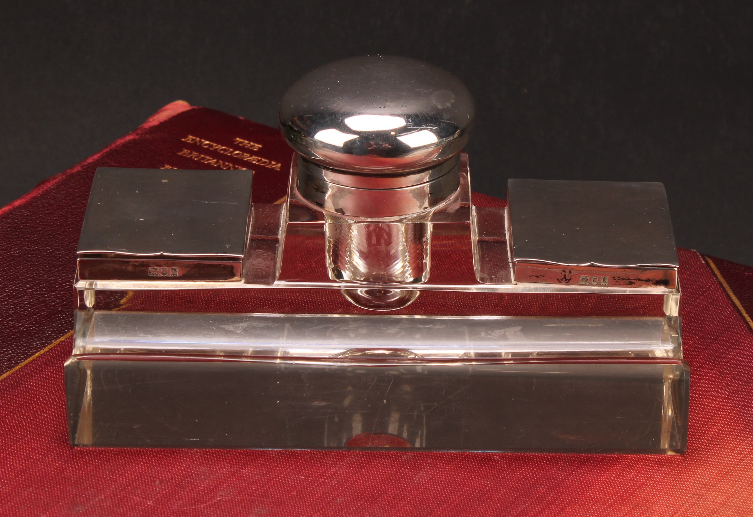 An Edwardian silver mounted combination inkstand and stamp box, the central well flanked by a pair