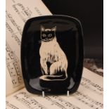 A mid-20th century studio pottery dish, by Eric Leaper for Newlyn Pottery, decorated with a cat,