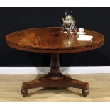 A William IV mahogany centre table, circular tilting top, turned column carved with lotus, incurve