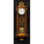 A late 19th century walnut Vienna regulator wall clock, 16cm circular dial inscribed with Roman