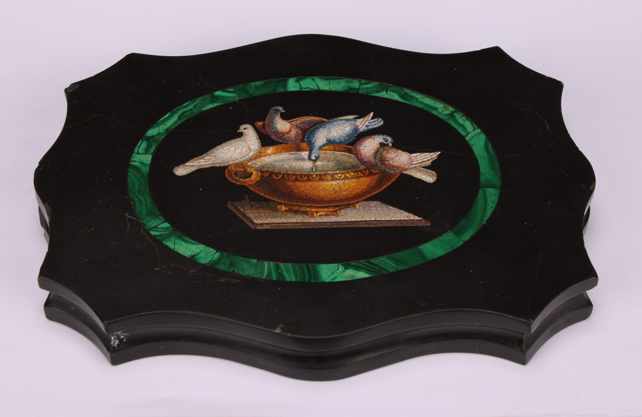 An Italian Grand Tour micro-mosaic cartouche shaped black marble desk weight, decorated in - Image 2 of 5