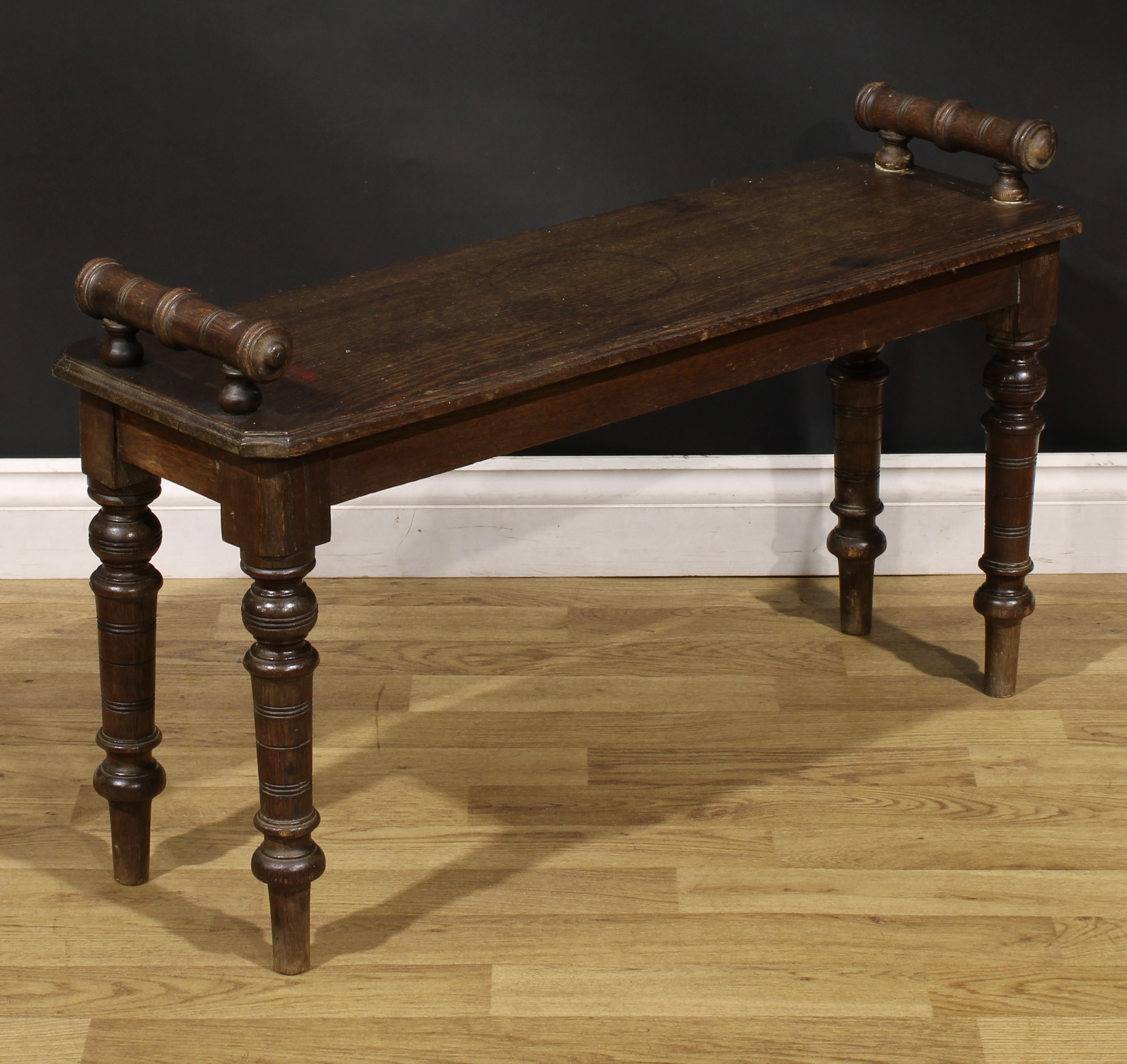 A Victorian oak window seat, canted rectangular top with turned handles, turned legs, 55cm high, - Image 2 of 4