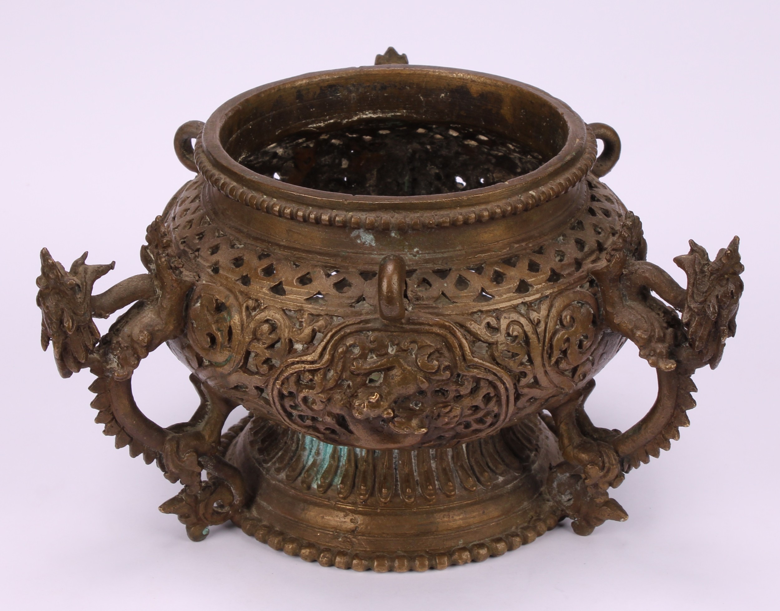 A Chinese bronze hanging censer, pierced and cast with dragons, temple lions and scrolls, 18.5cm - Image 2 of 3