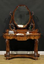 A Victorian walnut duchess dressing table, the superstructure with shaped mirror above three