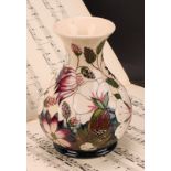 A contemporary Moorcroft Bramble Revisited pattern ovoid vase, 16cm high, impressed and painted
