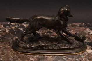 French School (19th century), a brown patinated bronze, of a retriever dog, oval base, 18cm long