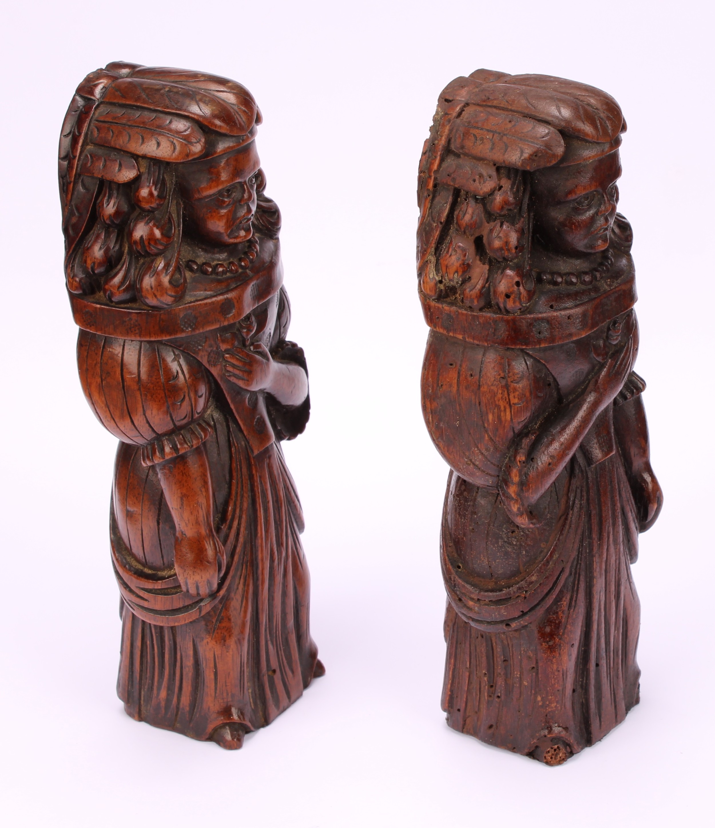 A pair of Continental walnut appliques, each carved as a lady of the court holding a flower to her - Image 3 of 4