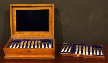 A Victorian walnut canteen box, enclosing silver and mother of pearl flatware comprising twelve fish