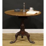 A George III mahogany tripod occasional table, circular tilting top, baluster column, cabriole
