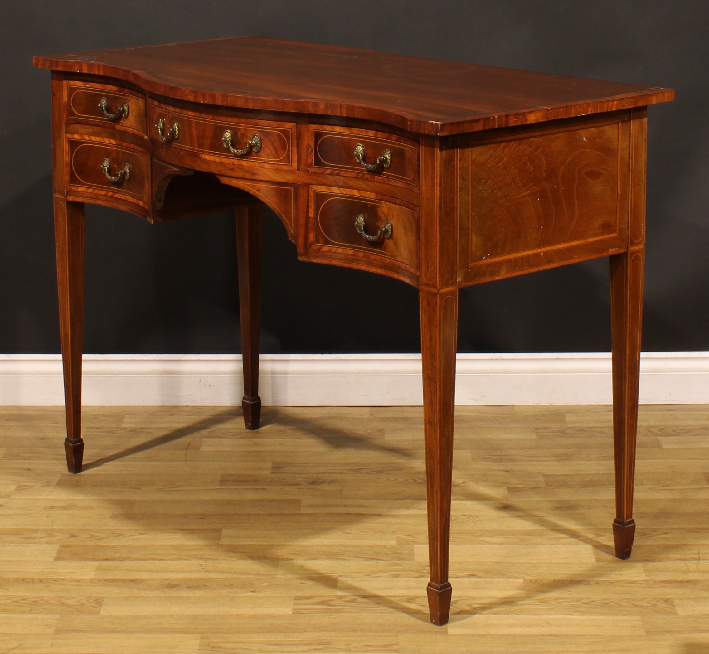 A Sheraton Revival satinwood banded mahogany serpentine serving table, oversailing top above five - Image 5 of 6