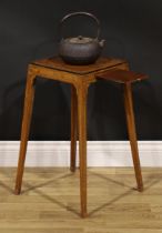 A George III Sheraton period mahogany, rosewood and tulipwood kettle stand, panel top above a slide,