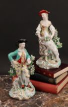 A pair of Derby figures, The Garland Shepherds, he wearing a broad brimmed black hat, turquoise