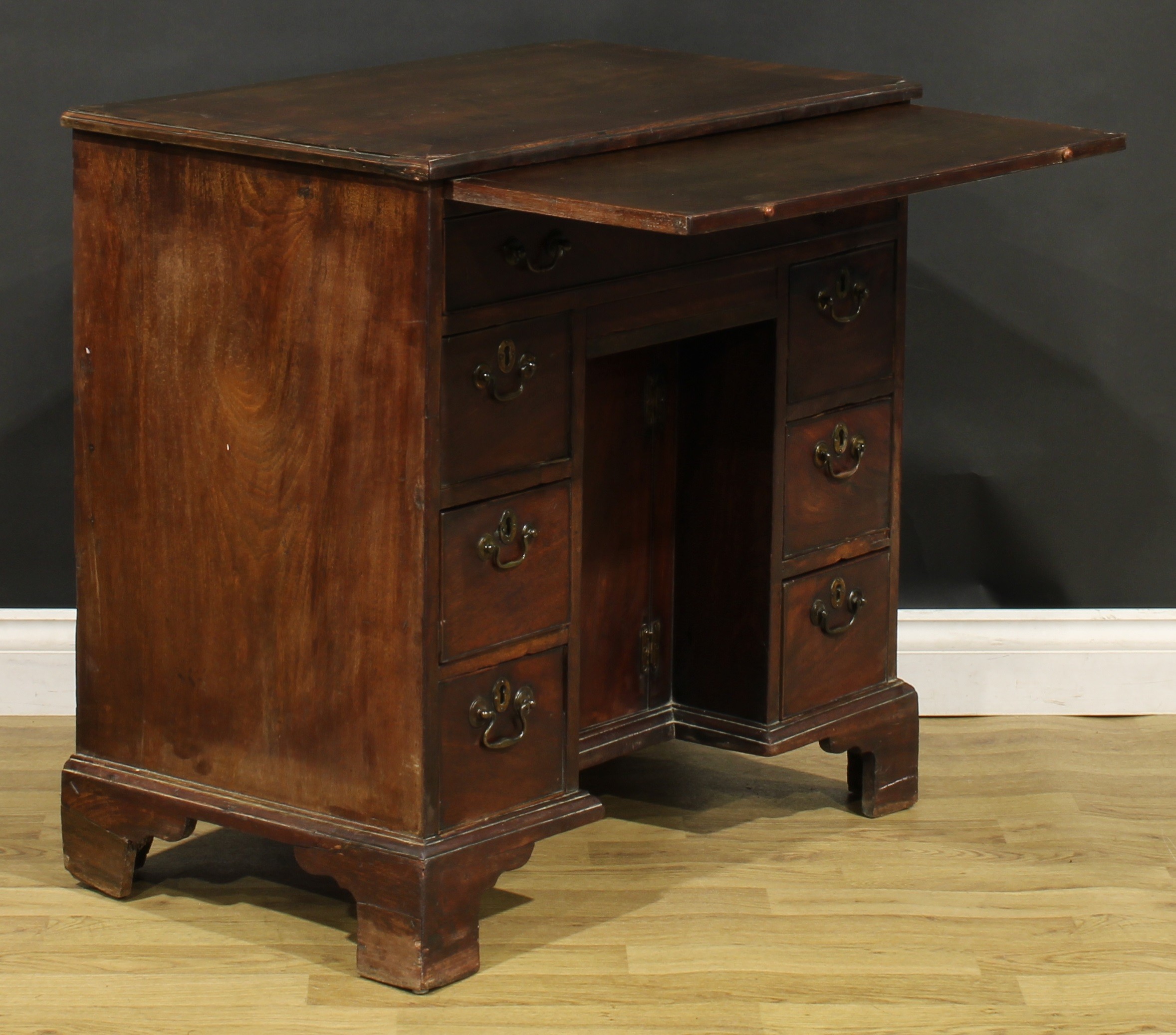 A George III mahogany kneehole desk, slightly oversailing top with moulded edge above a slide and - Image 5 of 8