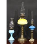 A late Victorian/Edwardian table oil lamp, Duplex burner, moulded graduated yellow glass font, brass