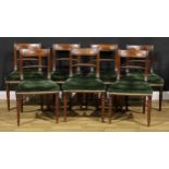 A set of seven Regency mahogany rope-twist bar-back dining chairs, curved cresting rail inlaid