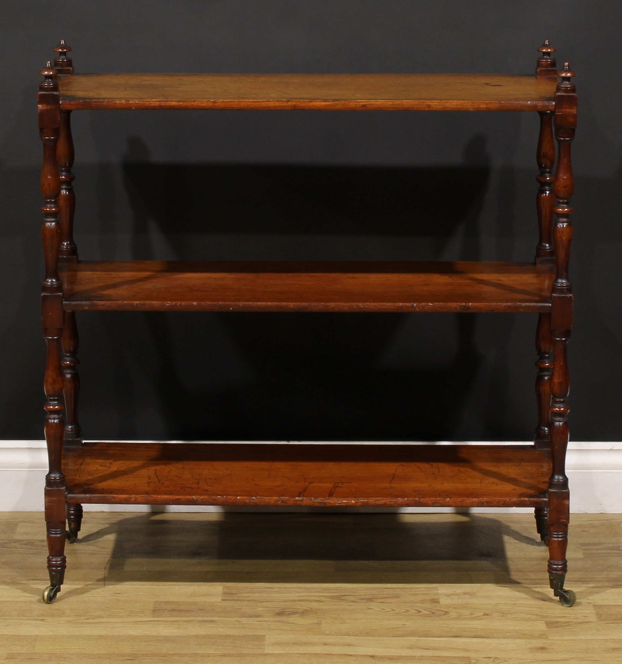 A George IV mahogany rectangular three tier whatnot, turned finials and supports, brass casters, - Image 5 of 5