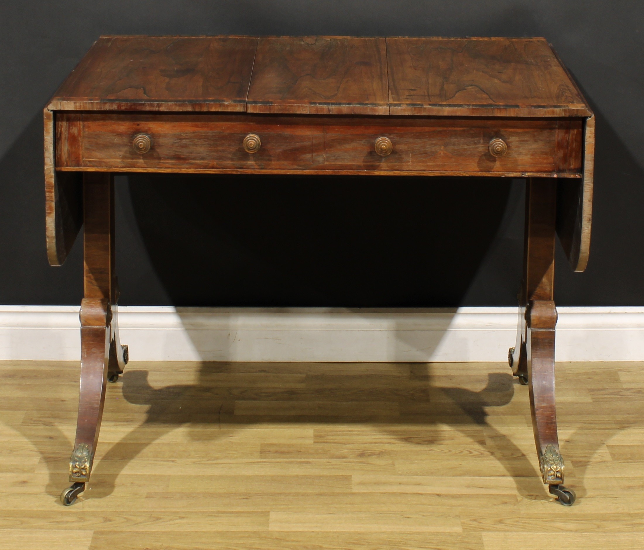 A Regency rosewood sofa table, crossbanded rounded rectangular top with fall leaves, above a pair of - Image 7 of 7
