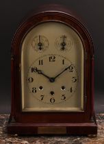 An early 20th century mahogany musical mantel clock, 16cm arched silvered dial inscribed with Arabic