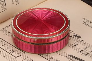 An early 20th century Continental silver and pink guilloche enamel circular table snuff box, push-