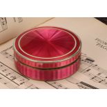 An early 20th century Continental silver and pink guilloche enamel circular table snuff box, push-