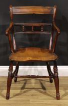 An early 19th century yew and elm elbow chair, saddle seat, turned legs, H-stretcher, 86cm high,